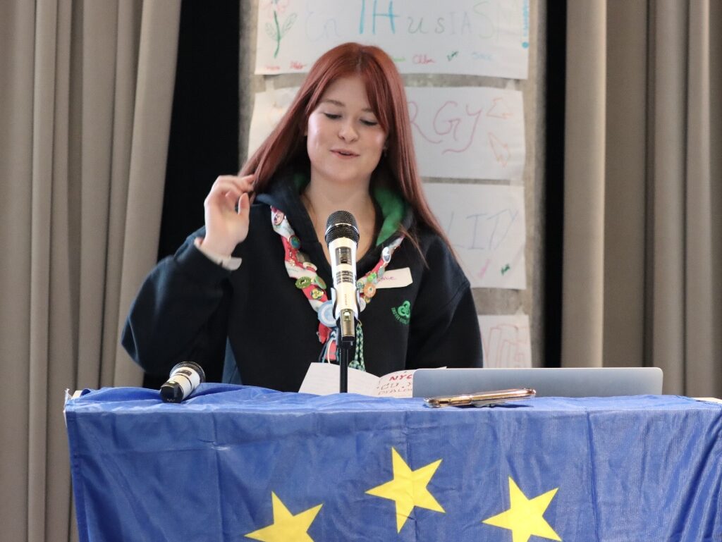 Katie delivering her speech in Irish